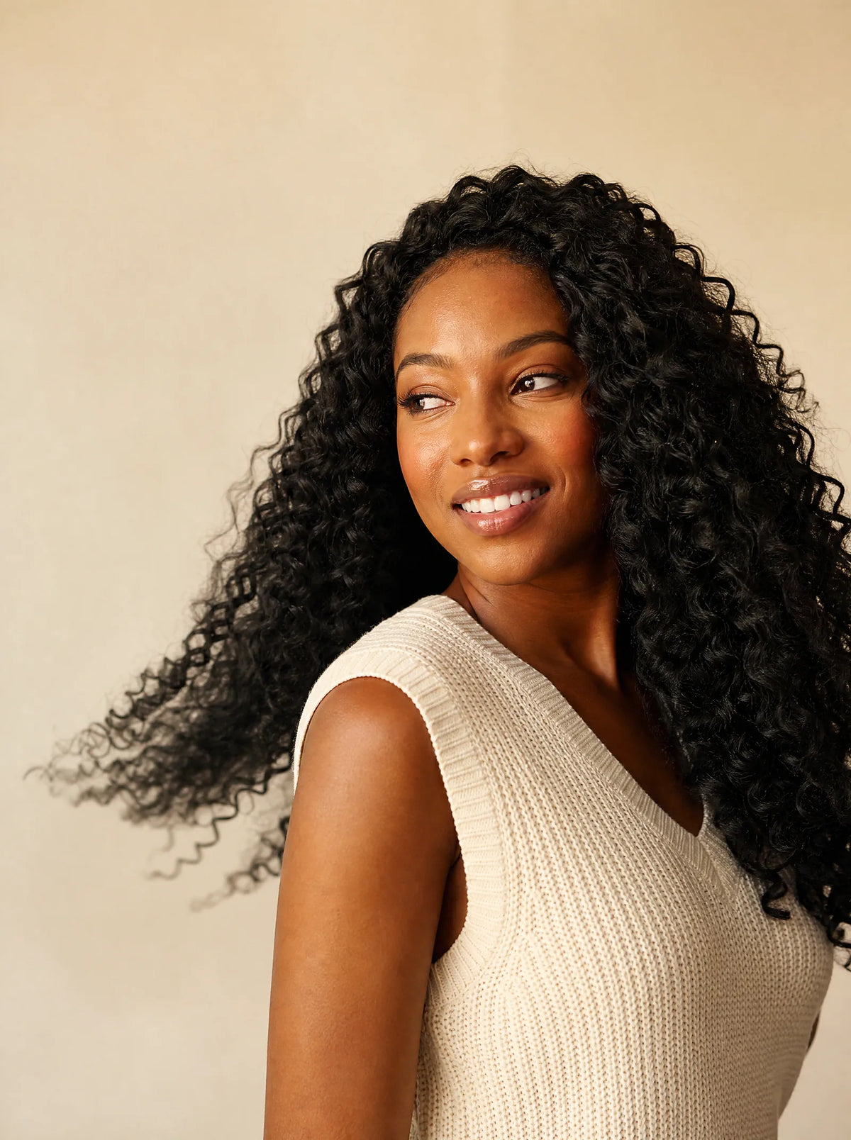 Illustrative long, rounded-curl look from the Crochet collection imagery.